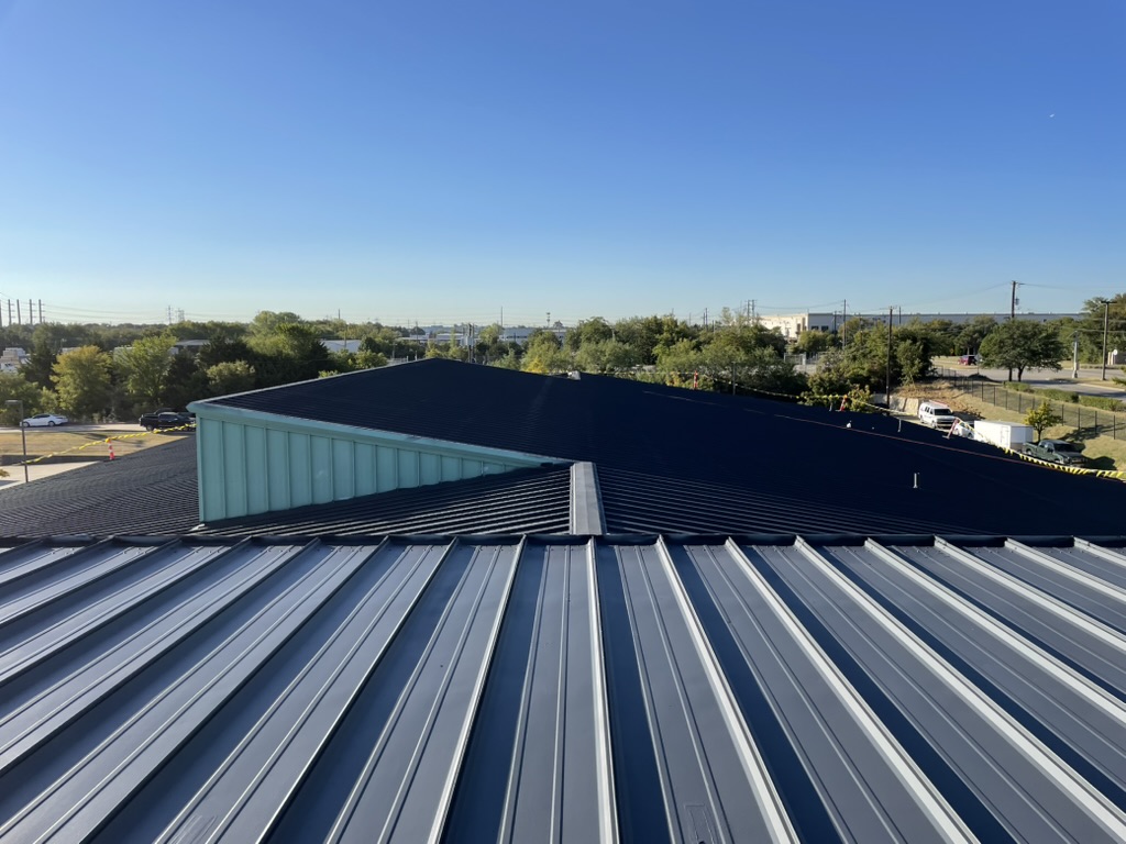 Charcoal GAF acrylic top coat finish across the 35,000 sq ft roof at Bear Creek Ct, Irving