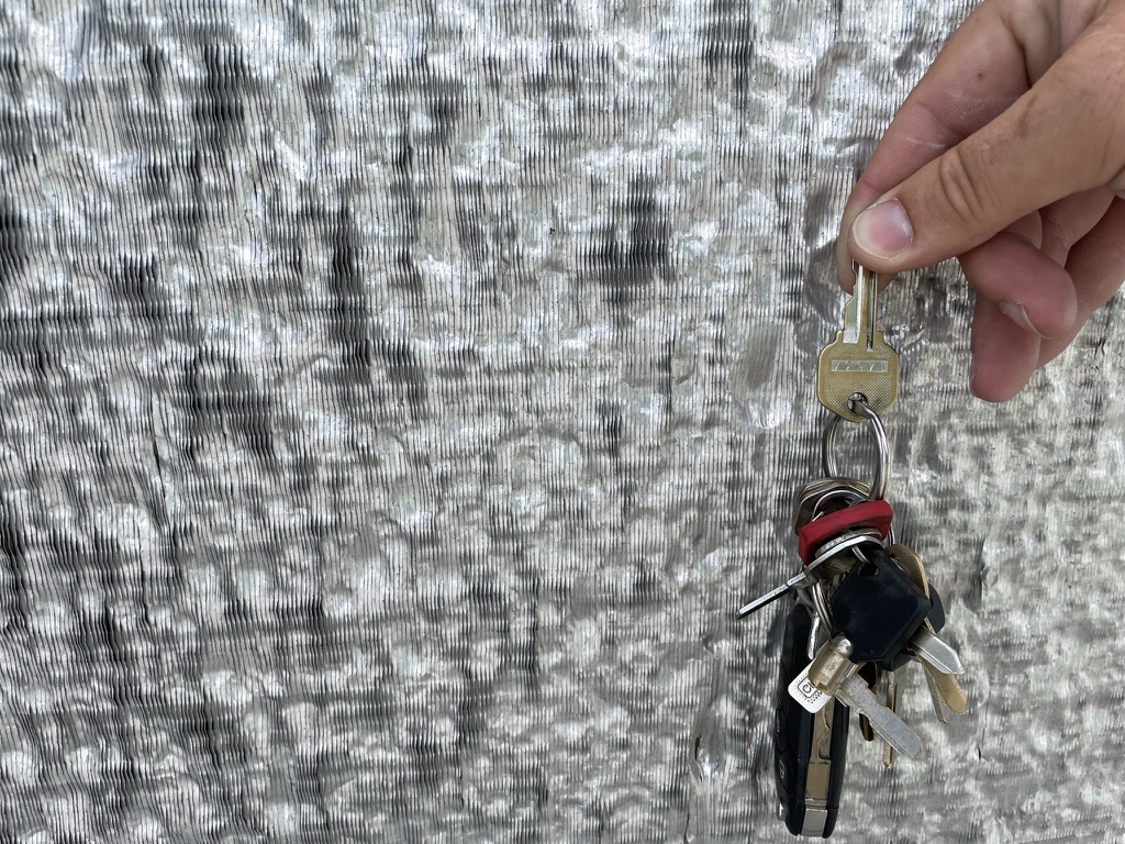 Surface granule loss across the Mod-Bit membrane after a hail storm in Irving, Texas