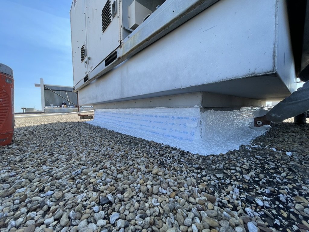 Silicone mastic 3-course application at a mechanical RTU curb on the 80,000 sq ft roof, Irving, TX