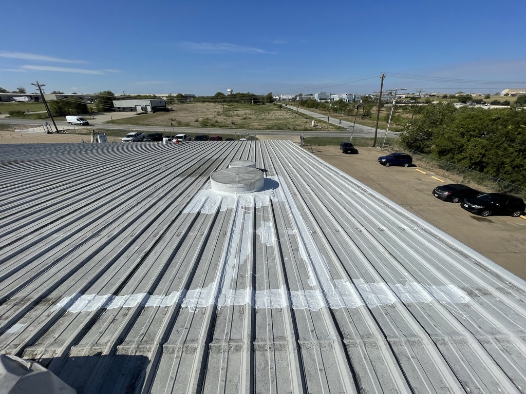 Completed acrylic roof coating repair stopping the leaks at 208 Sentry Dr, Mansfield, TX