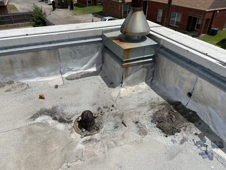 Roof drain and membrane damage from chronic chiller condensation at 7611 Military Pkwy, Dallas, TX