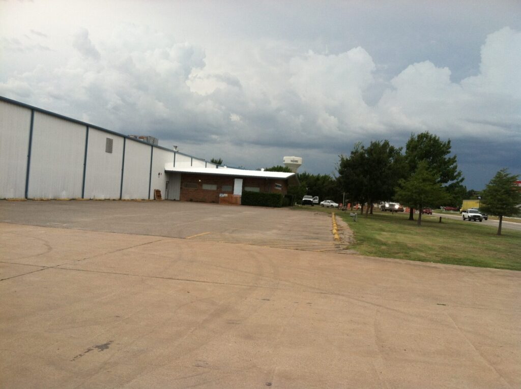 Finished Lapolla Thermo-Flex 1000 acrylic roof coating at Quadrant Performance Materials, McKinney, TX